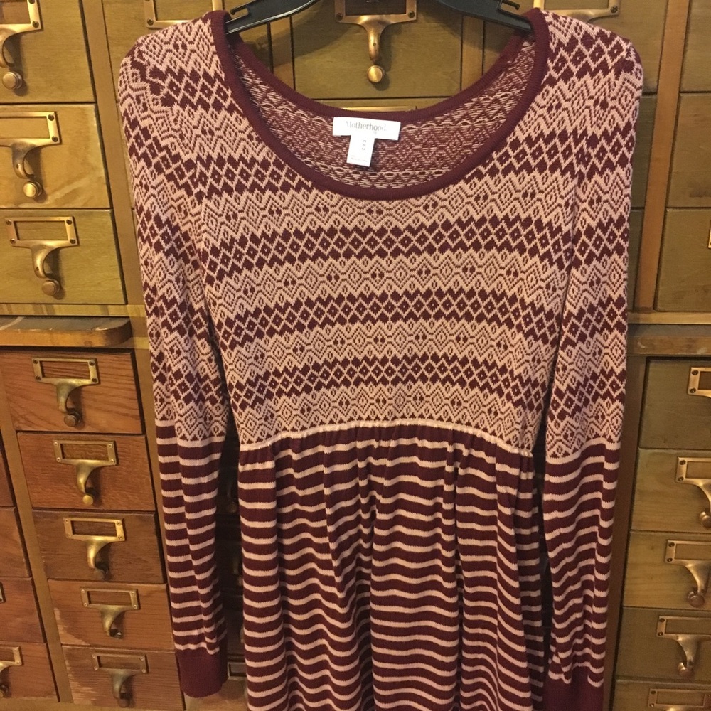 Burgundy and pink maternity sweater.